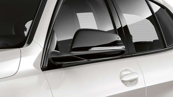 Black mirror caps. BMW 1 Series Model Sport Line with Black mirror caps.