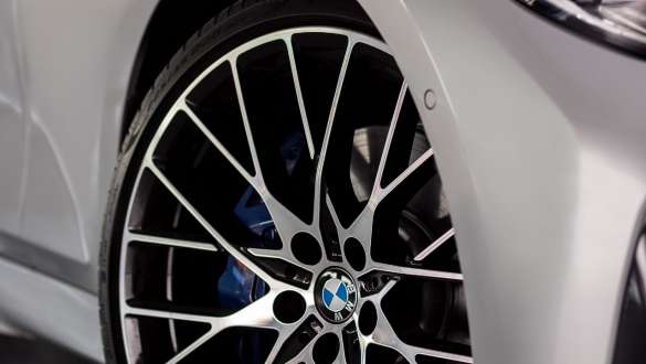 BMW 3 Series Sedan, M Sport differential. Side view oft he rear of the BMW 3 Series Sedan from below.