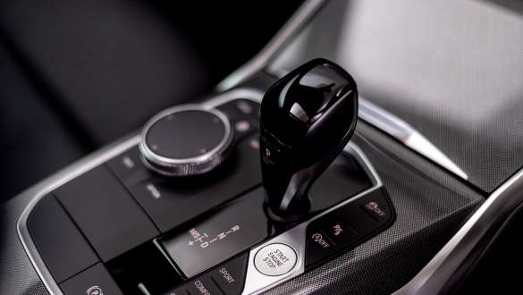 BMW 3 Series Sedan, Steptronic Sport transmission. Detailed bird's eye view of the centre console of the BMW 3 Series Sedan with gear lever and Steptronic Sport transmission.