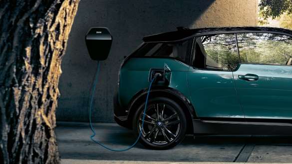 BMW i3 I01 2018 on BMW Wallbox BMW i3 I01 2018 Blue Ridge Mountain with Frozen Grey metallic highlight charging at BMW Wallbox