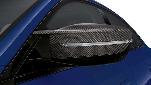 M Carbon exterior package BMW i4 M50 G26 2021 BMW Individual Frozen Portimao Blue metallic M mirror cap close-up