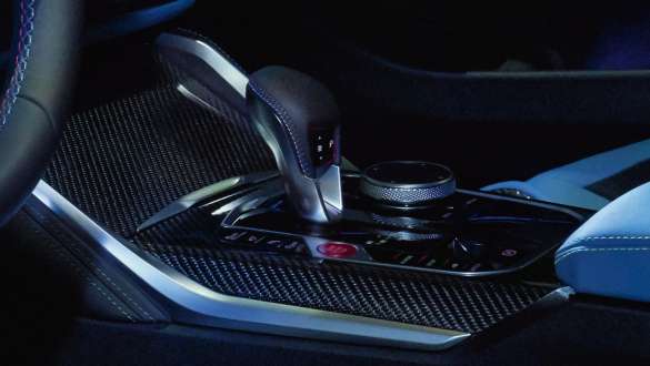 8-speed M Steptronic transmission BMW M4 Competition Coupé G82 2020 BMW M4 Competition Coupé G82 2020 8-speed M Steptronic transmission close-up centre console interior
