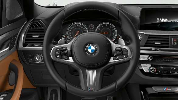BMW X3 M40i and BMW X3 M40d SUV G01, Variable sport steering. BMW X3 M40i and BMW X3 M40d SUV G01, interior, cockpit, M leather steering wheel, Variable sport steering.