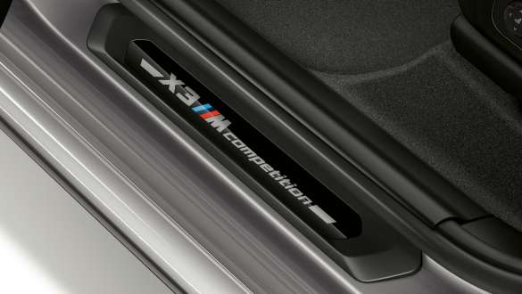 BMW X3 M Competition SUV F97, door sill finisher with Competition designation. BMW X3 M Competition SUV F97, interior, door sill finisher with Competition designation.