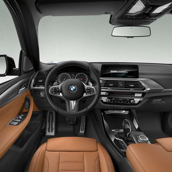 BMW X3 M40i and BMW X3 M40d, interior, cockpit with M leather steering wheel and M Sport seats. BMW X3 M40i and BMW X3 M40d, cockpit.