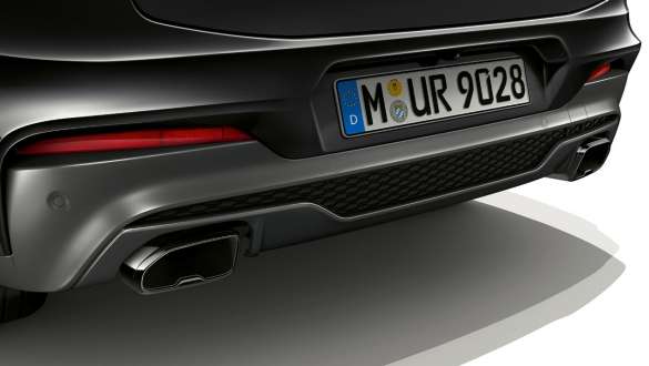 BMW X4 M40i and BMW X4 M40d SUV G02, exhaust pipes in Black Chrome. BMW X4 M40i and BMW X4 M40d SUV G02 in Black Sapphire metallic, exterior, exhaust pipes in Black Chrome.