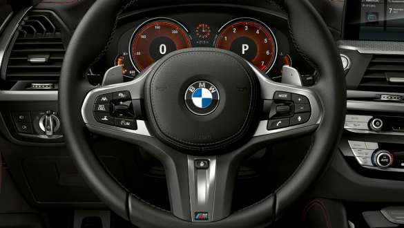 BMW X4 M40i and BMW X4 M40d SUV G02, M leather steering wheel. BMW X4 M40i and BMW X4 M40d SUV G02, interior, cockpit with M leather steering wheel.