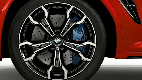 M compound brake F98. BMW X4 M Competition SUV F98 in Toronto Red metallic, exterior, M light alloy wheel with M compound brake.