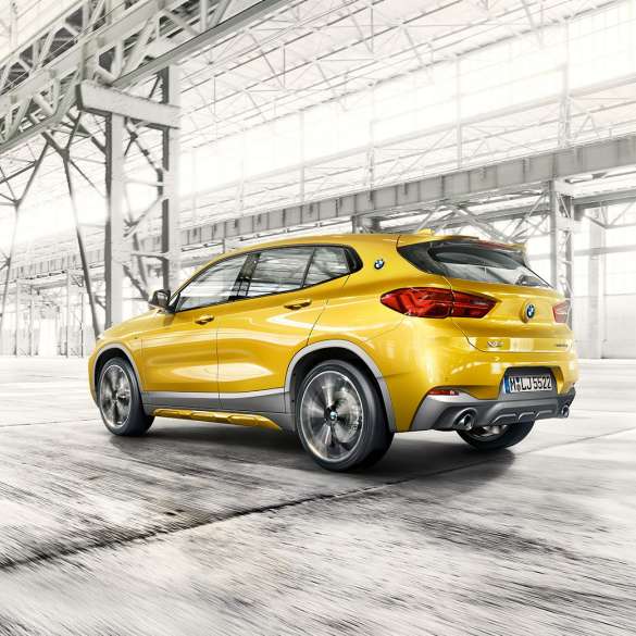 Three quarter side view BMW X2 SUV F39 BMW X2 SUV 2018 F39 Galvanic Gold metallic three quarter side view