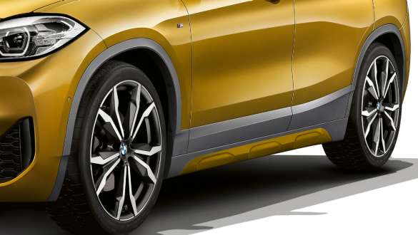 Side skirts BMW X2 SUV F39 Side skirts BMW X2 SUV 2018 F39 Galvanic Gold metallic three quarter side view