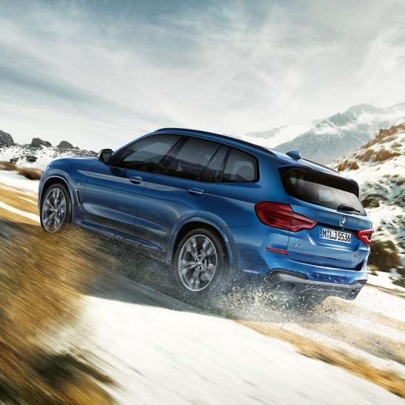 BMW X3 M40i SUV G01 at uphill drive BMW X3 M40i SUV G01 at uphill drive