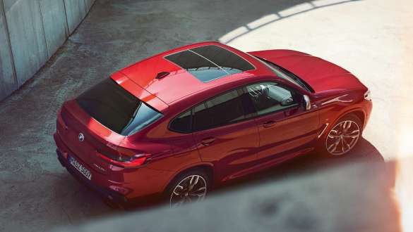 BMW X4 from bird’s eye view BMW X4 M40i G02 2018 Flamenco Red brilliant effect bird’s eye view