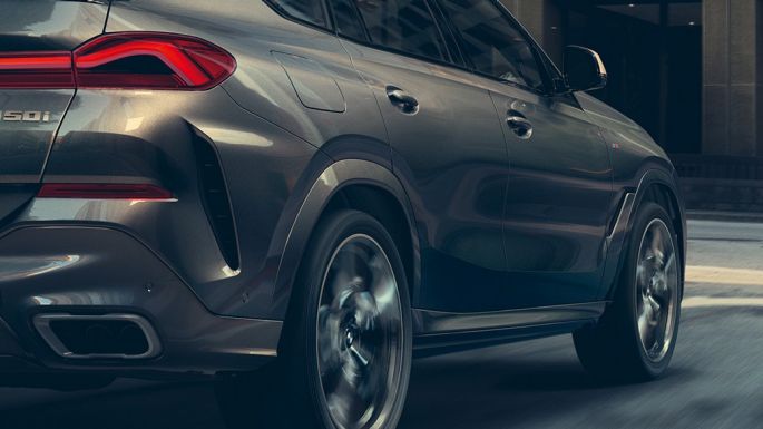 Adaptive M suspension Professional G06. Threequarter rear view of the BMW X6 SUV G06.
