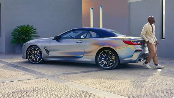 Plug-in hybrid BMW X2 xDrive25e F39 three-quarter side view driving Plug-in hybrid BMW X2 xDrive25e F39 three-quarter side view driving on the street