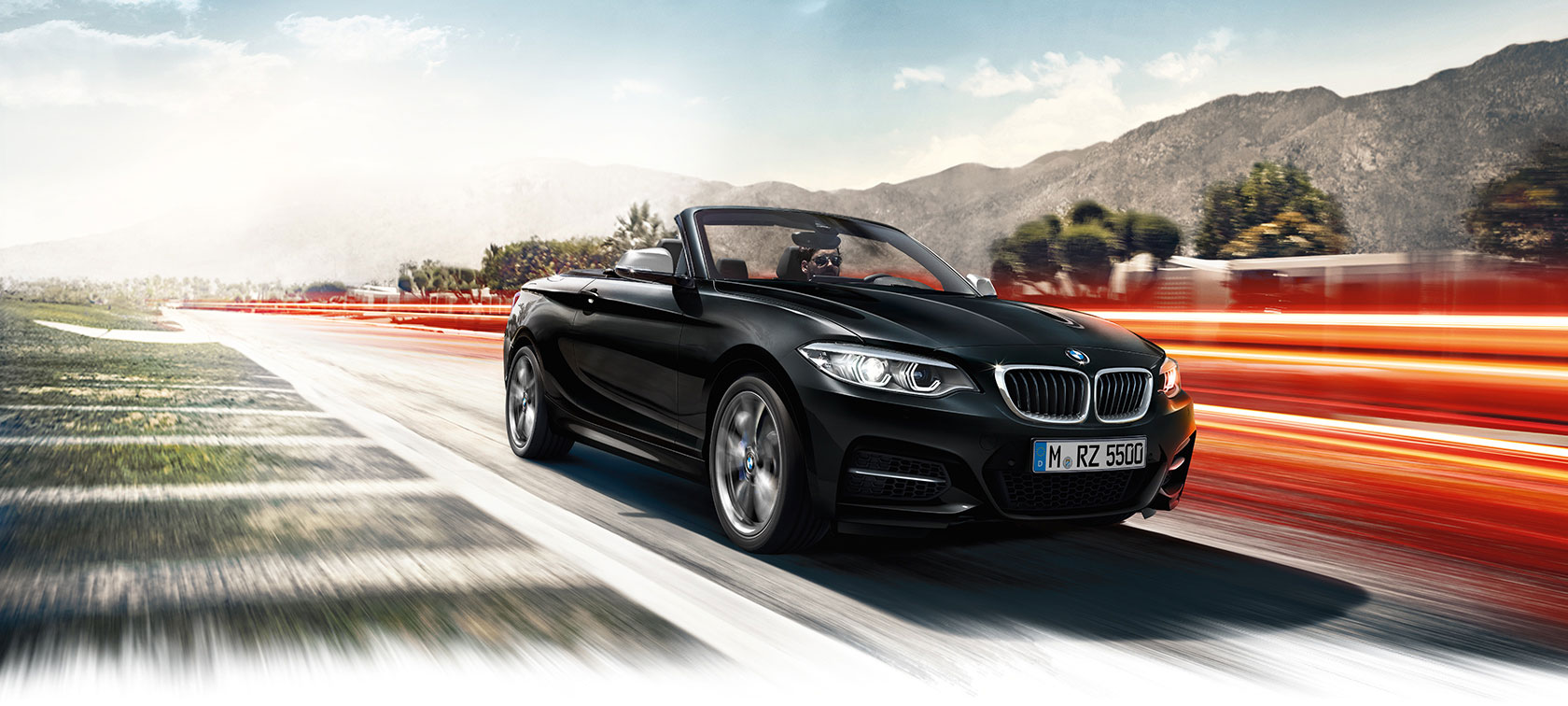 New BMW 2-Series Convertible black car: driving on hills New BMW 2-Series Convertible black car: driving on hills