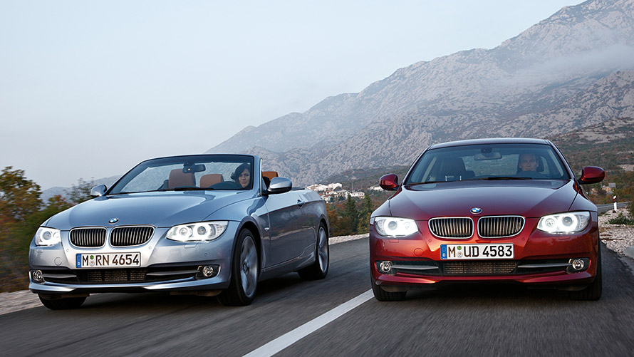 BMW 3 Series Sedan E90 BMW 3 Series Convertible E93 fifth generation front view on the street BMW 3 Series models BMW 3 Series Sedan E90 BMW 3 Series Convertible E93 fifth generation front view on the street