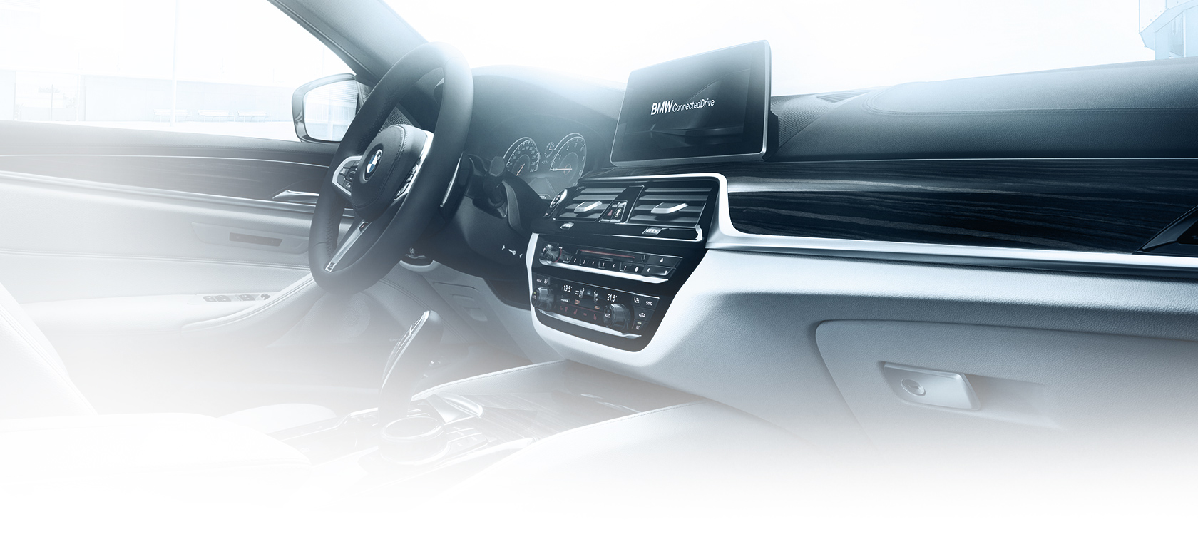 BMW 5-Series Sedan grey and black inside view