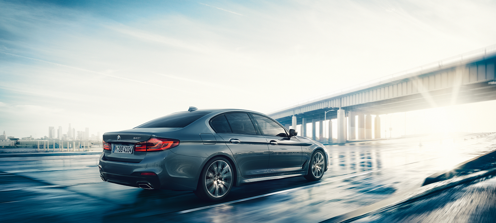BMW 5 Series Sedan 540i Sedan BMW 5 Series Sedan 540i Sedan G30 Bluestone metallic three-quarter rear view