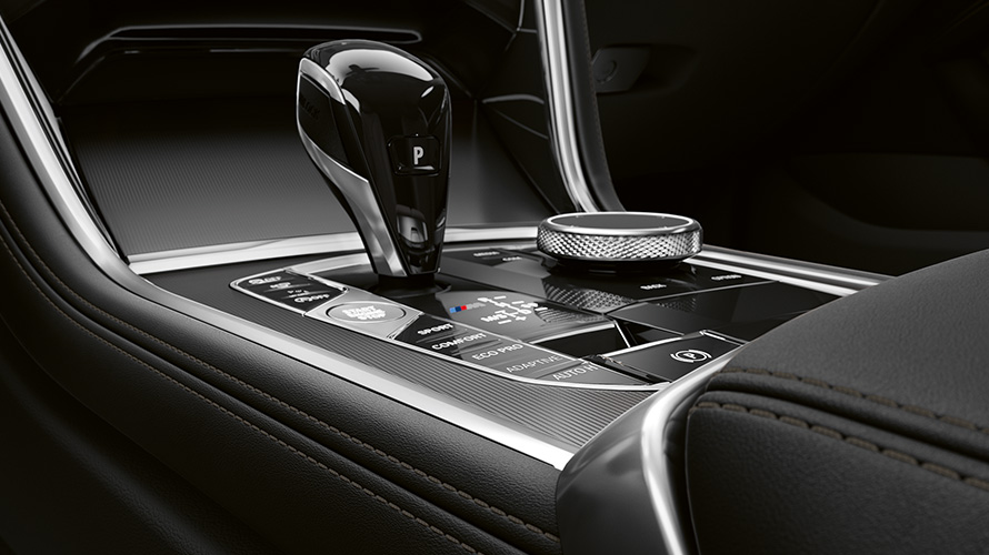 Close-up of the middle console of the BMW 8 Series Coupé.