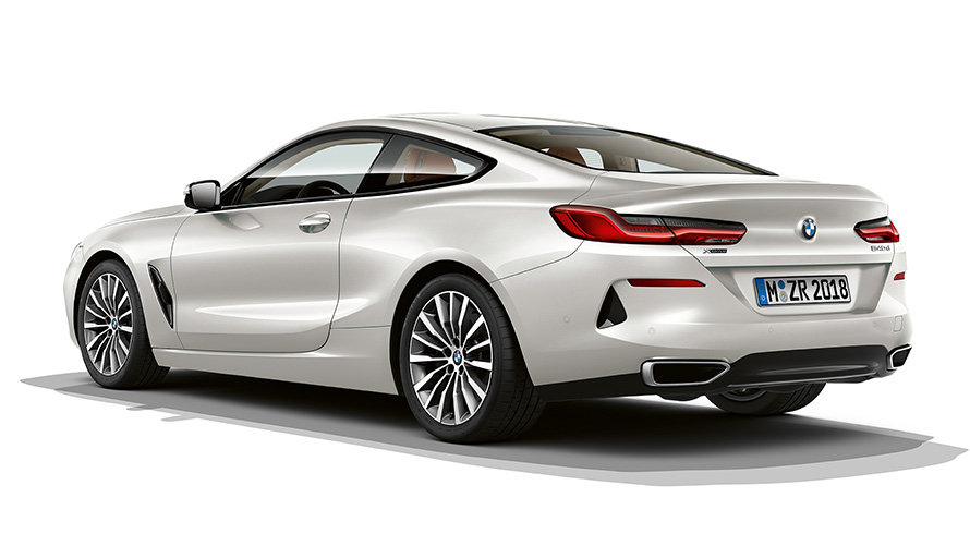 Still shot of the BMW 8 Series Coupé in Bluestone metallic against a white background.