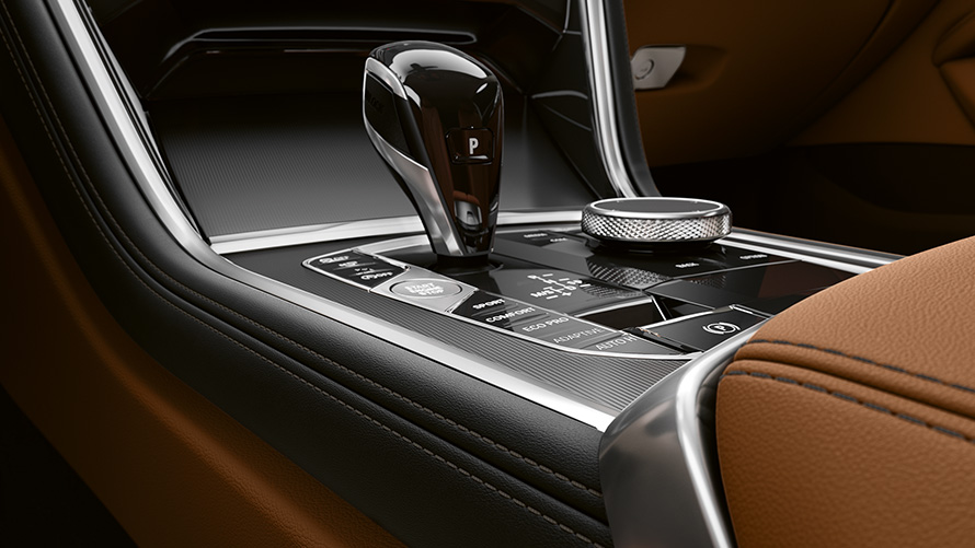Close-up of the middle console of the BMW 8 Series Coupé.