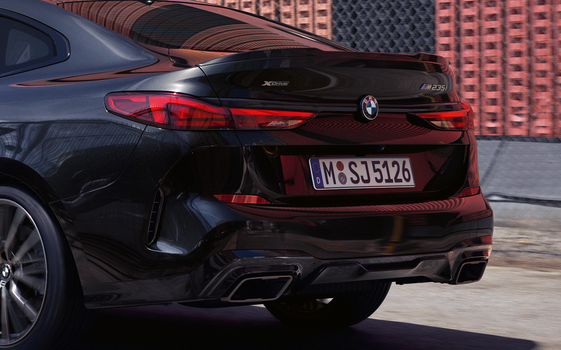 Rear section BMW M235i xDrive Gran Coupé F44 Athletic rear section BMW M235i xDrive Gran Coupé F44 2020 Black Sapphire metallic three-quarter rear view