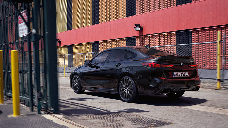 BMW M235i xDrive Gran Coupé F44 technical data BMW M235i xDrive Gran Coupé F44 Black Sapphire metallic three-quarter rear view driving
