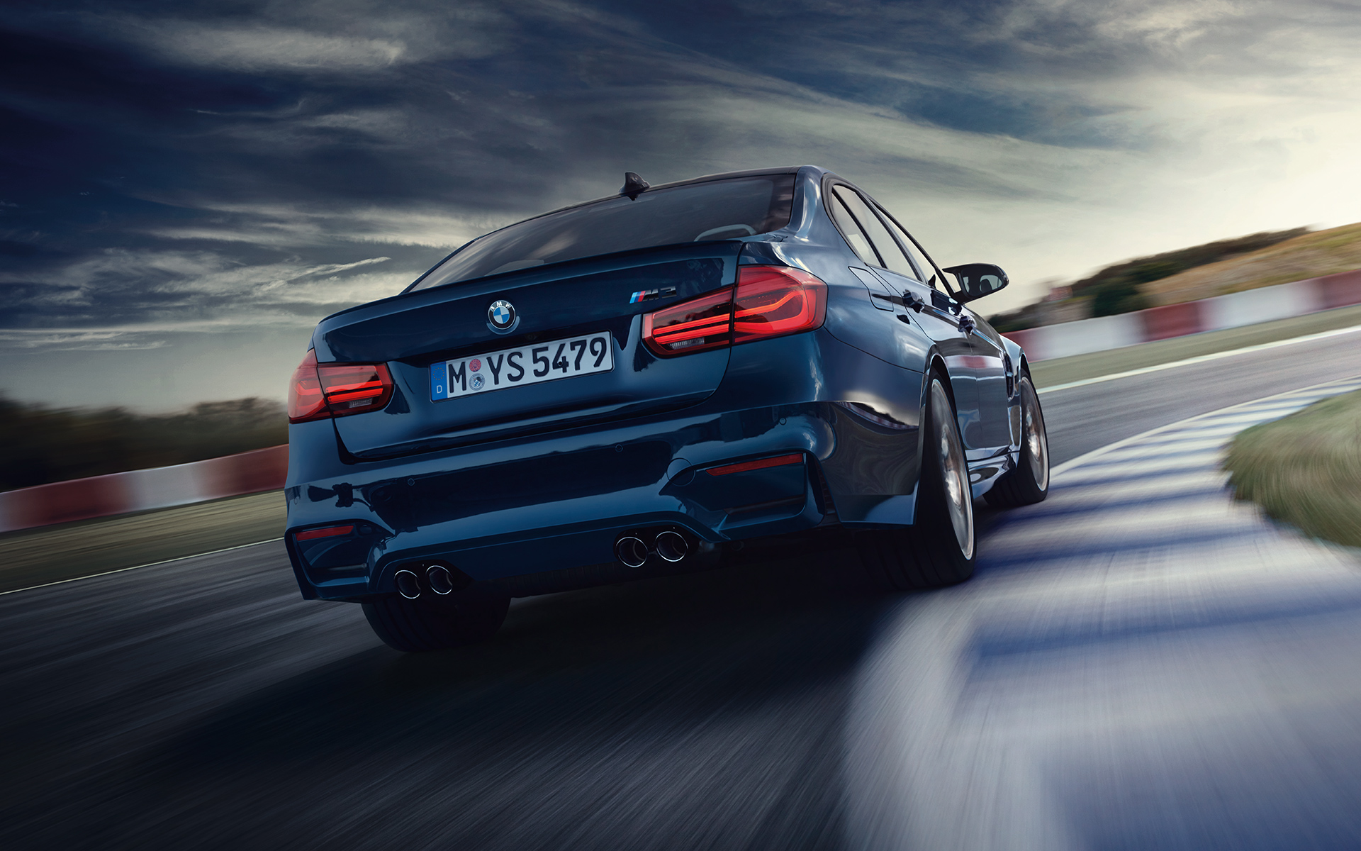 LED rear lights. BMW M3 Sedan design three-quarter rear shot.