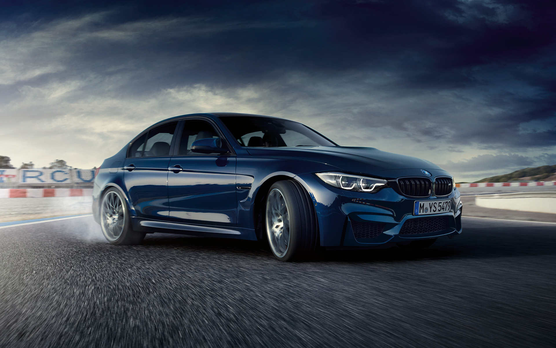 Light alloy wheels. BMW M3 Sedan design side shot.