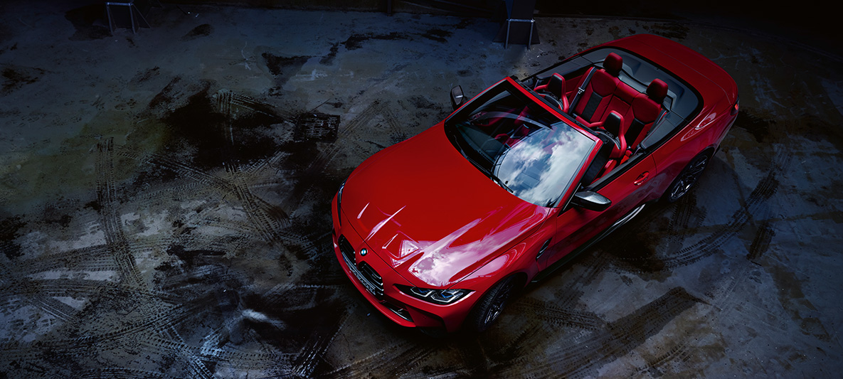 BMW Individual Imola Red metallic BMW M4 Competition Convertible with M xDrive G83 2021 BMW M4 Competition Convertible with M xDrive G83 2021 BMW Individual Imola Red metallic three-quarter front view bird’s eye view with open softtop