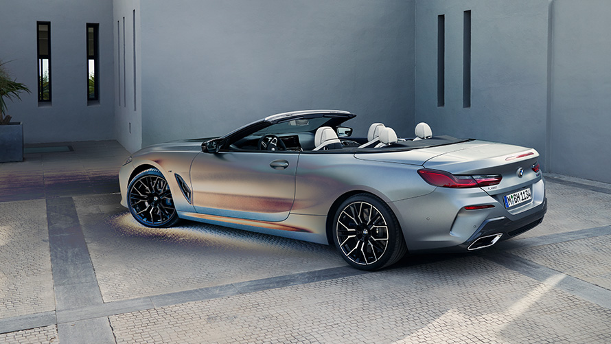 Three-quarter rear view BMW 8 Series Convertible 2022 G14 LCI Facelift BMW Individual Frozen Pure Grey metallic  BMW 8 Series Convertible 2022 G14 LCI Facelift BMW Individual Frozen Pure Grey metallic three-quarter rear view