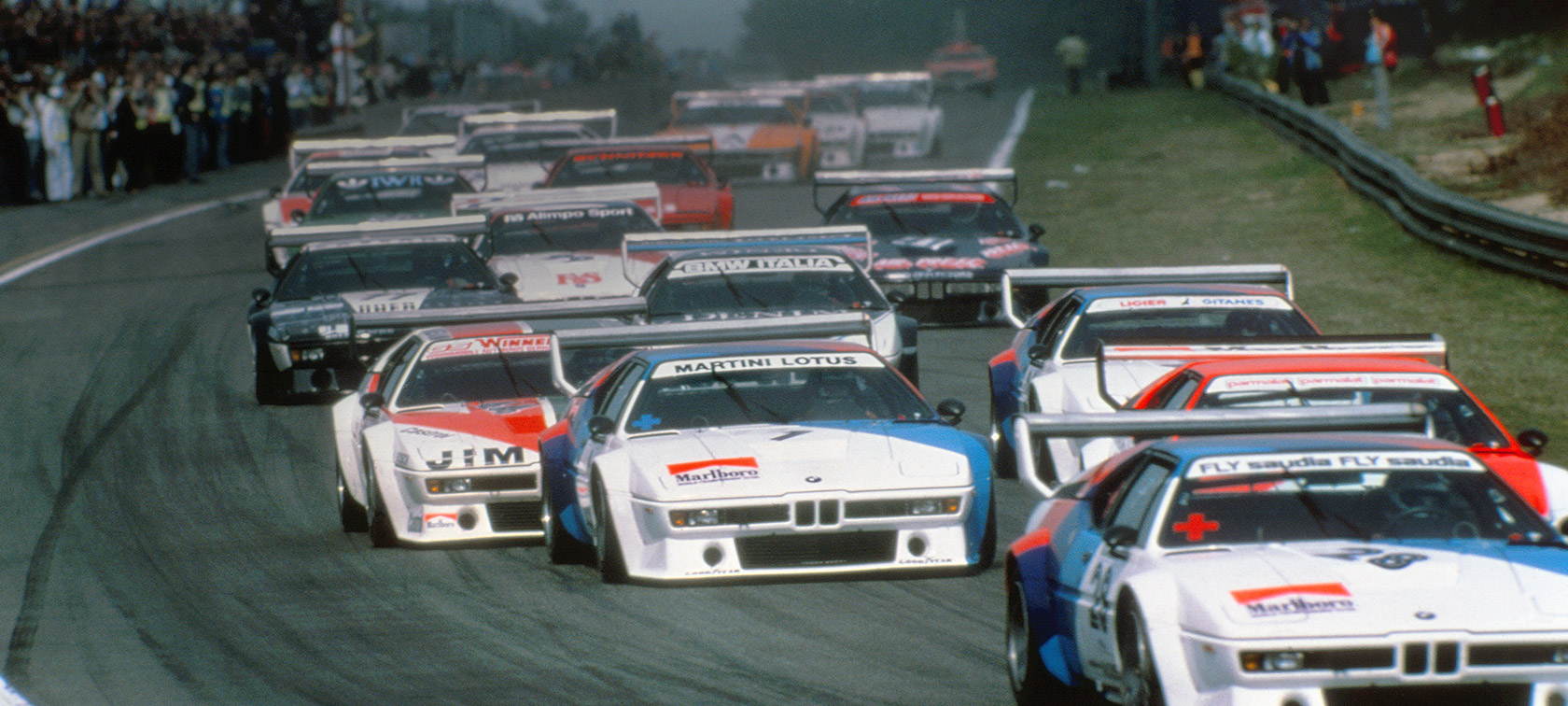 BMW M vehicles driving on race track BMW M Series BMW M vehicles driving on race track
