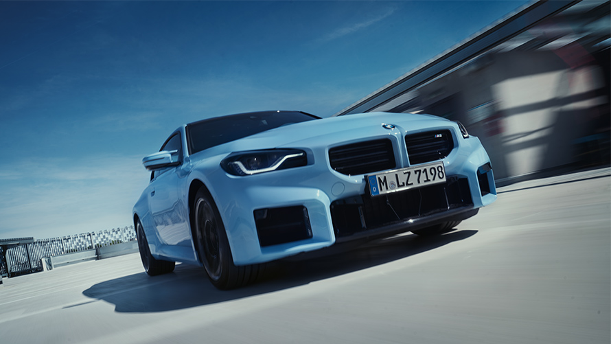 BMW M2 G87 front view drivingdirivng on the street BMW M Series BMW M2 G87 front view drivingdirivng on the street