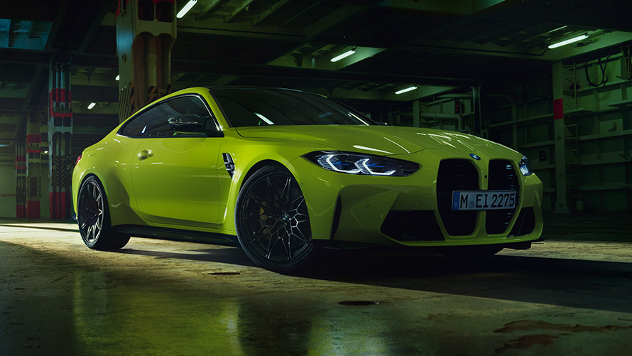 BMW M4 G82 three-quarter side view standing BMW M Series BMW M4 G82 three-quarter side view standing