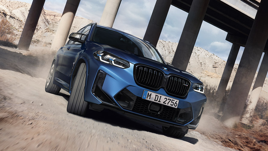 BMW X3 M F97 three-quarter front view driving BMW M Series BMW X3 M F97 three-quarter front view driving