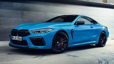 BMW M Series BMW M8 F92 three-quarter rear view standing with model