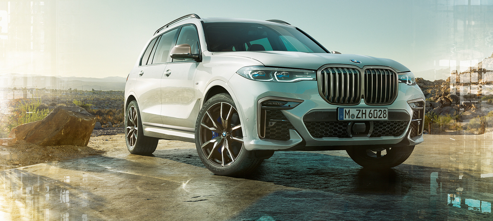 BMW X7 M Automobile G07 2019 Mineral White three-quarter front view standing