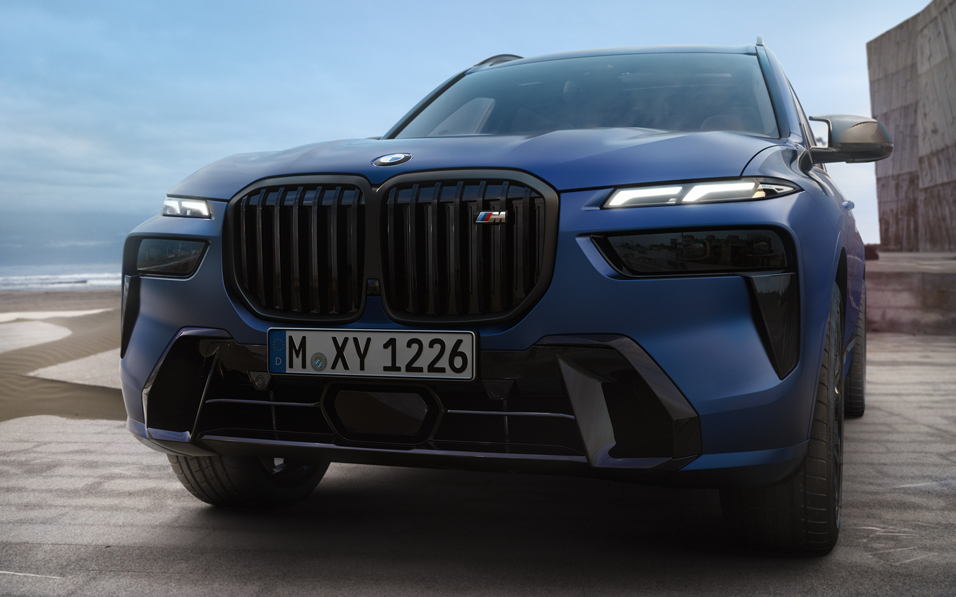 Front BMW X7 M60i xDrive G07 LCI Frozen Marina Bay Blue standing close-up Front BMW X7 M60i xDrive G07 LCI Frozen Marina Bay Blue standing close-up