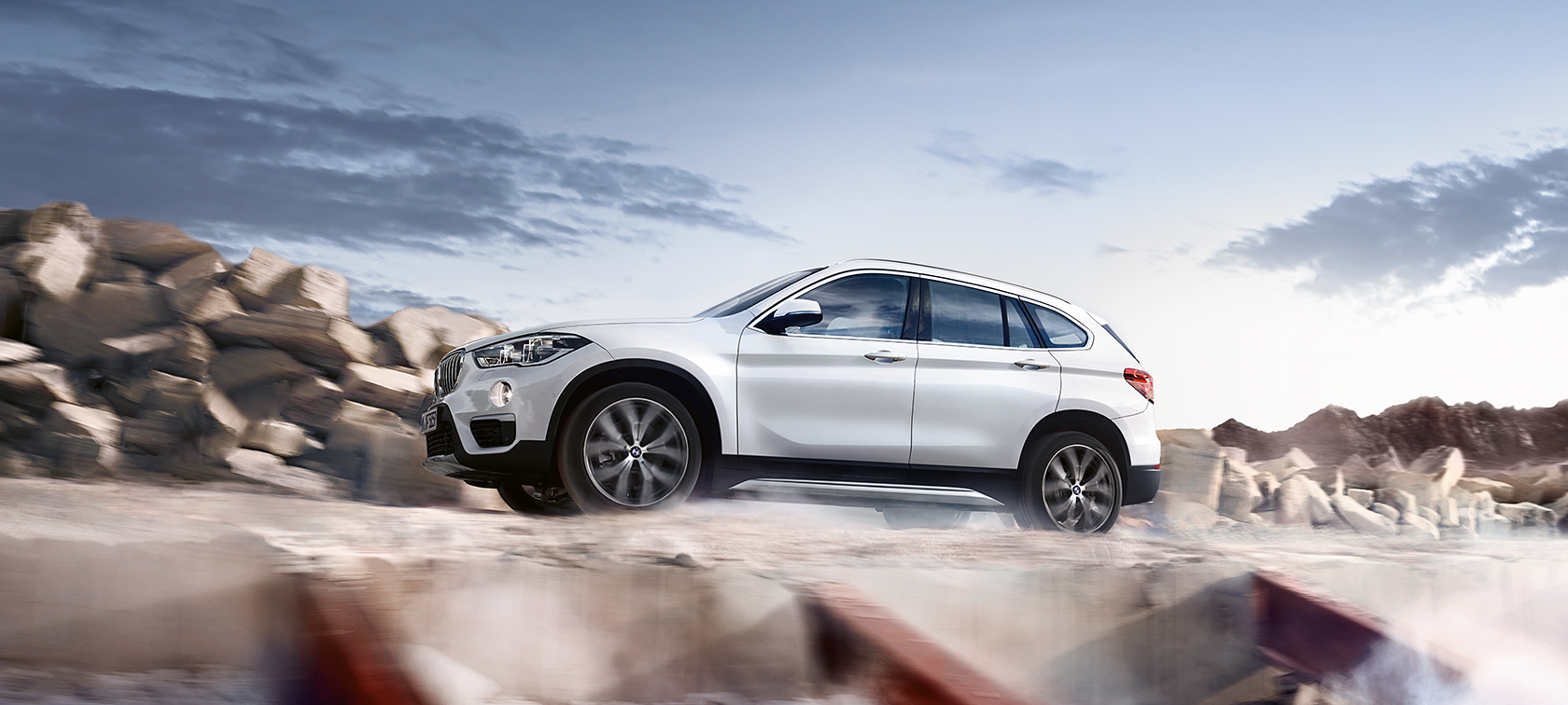 BMW X-Series X1 white side view: skyline BMW X-Series X1 white side view: skyline