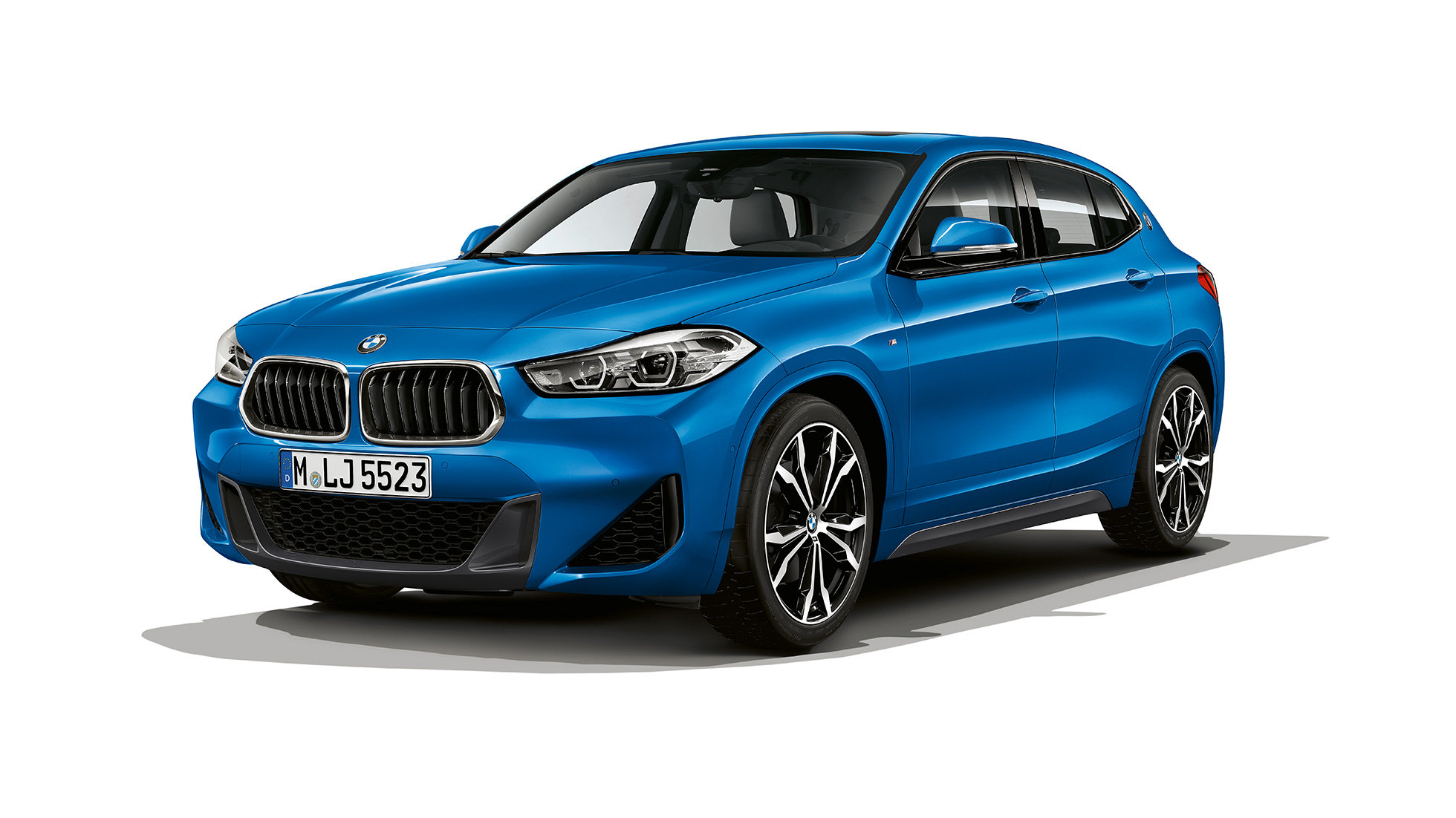 Three quarter front view BMW X2 sDrive20i SUV model M Sport F39 BMW X2 sDrive20i SUV model M Sport 2018 F39 Misano Blue metallic three quarter front view