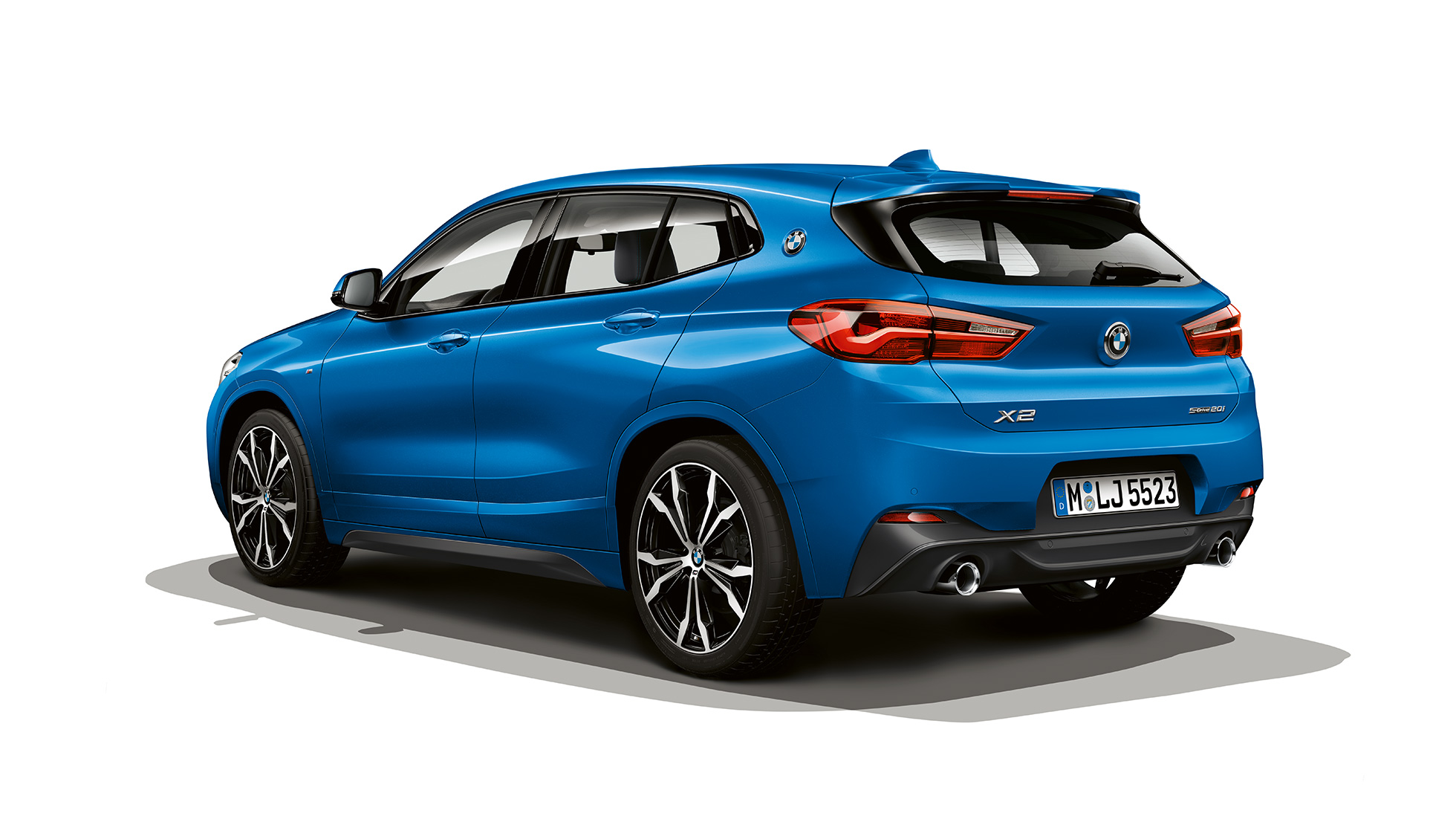 Three quarter side view BMW X2 sDrive20i SUV model M Sport F39 BMW X2 sDrive20i SUV model M Sport 2018 F39 Misano Blue metallic three quarter side view