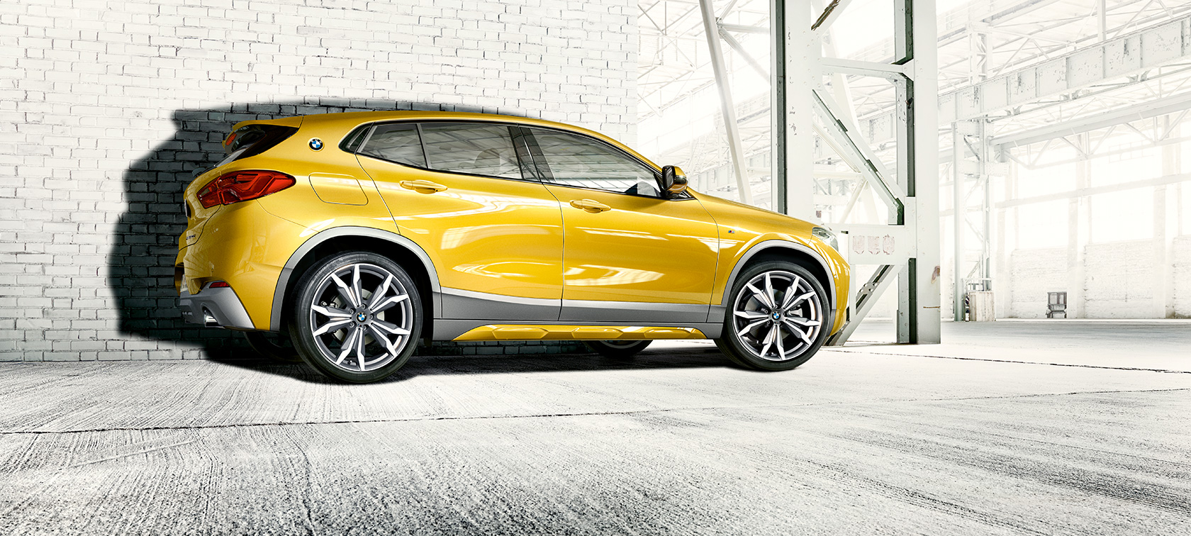 Side view BMW X2 SUV F39 Side view BMW X2 SUV 2018 F39 Galvanic Gold metallic