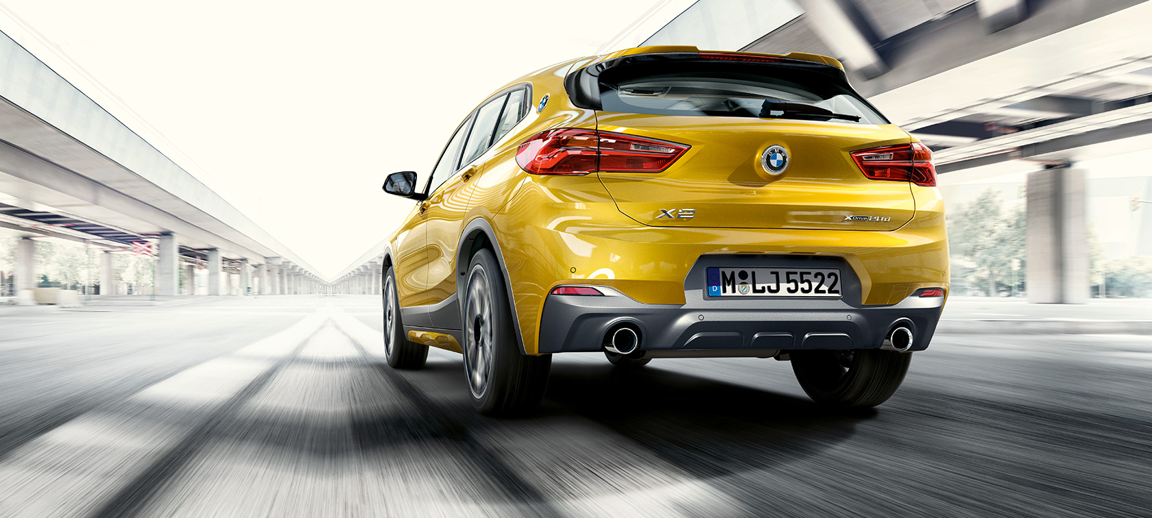 Three quarter front view BMW X2 SUV F39 Three quarter front view BMW X2 SUV 2020 F39 Brooklyn Grey in motion
