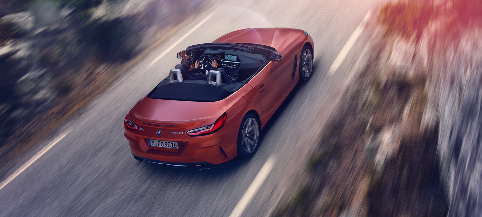 BMW Z4 Roadster (G29) three-quarter rear view from bird´s eye view driving