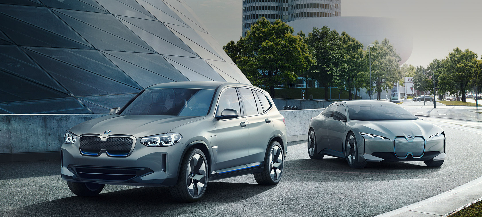 BMW Concept iX3 and BMW Vision iNEXT in front of a building BMW outlook 2023 BMW Concept iX3 and BMW Vision iNEXT in front of a building