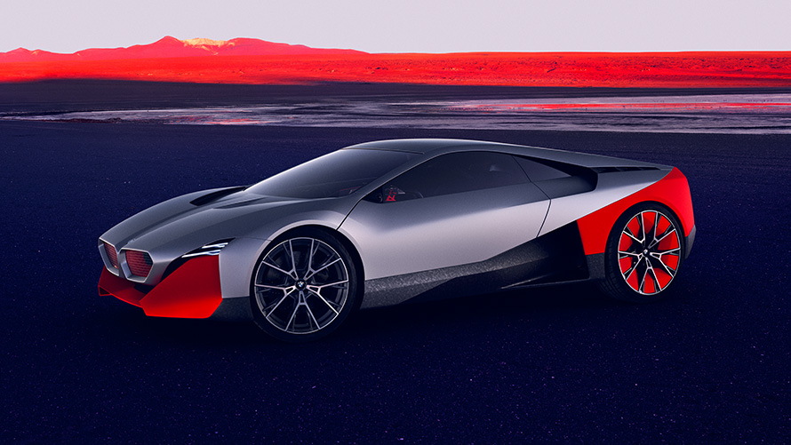 BMW Vision M NEXT in front of a forest BMW Vision M NEXT in front of a forest three-quarter front view