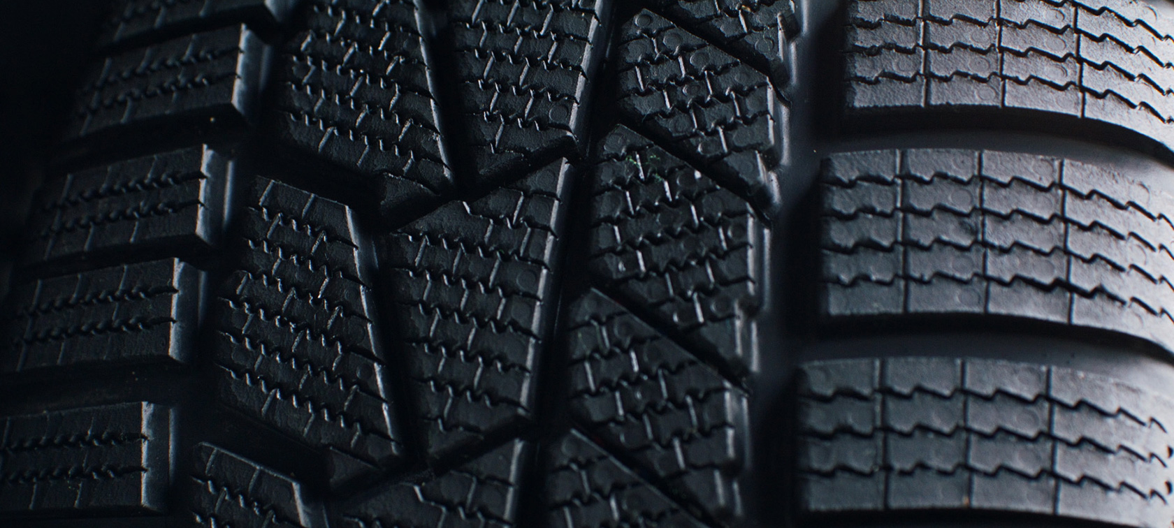 Close up view original BMW Tyre Close up view of the profile of an original BMW tyre