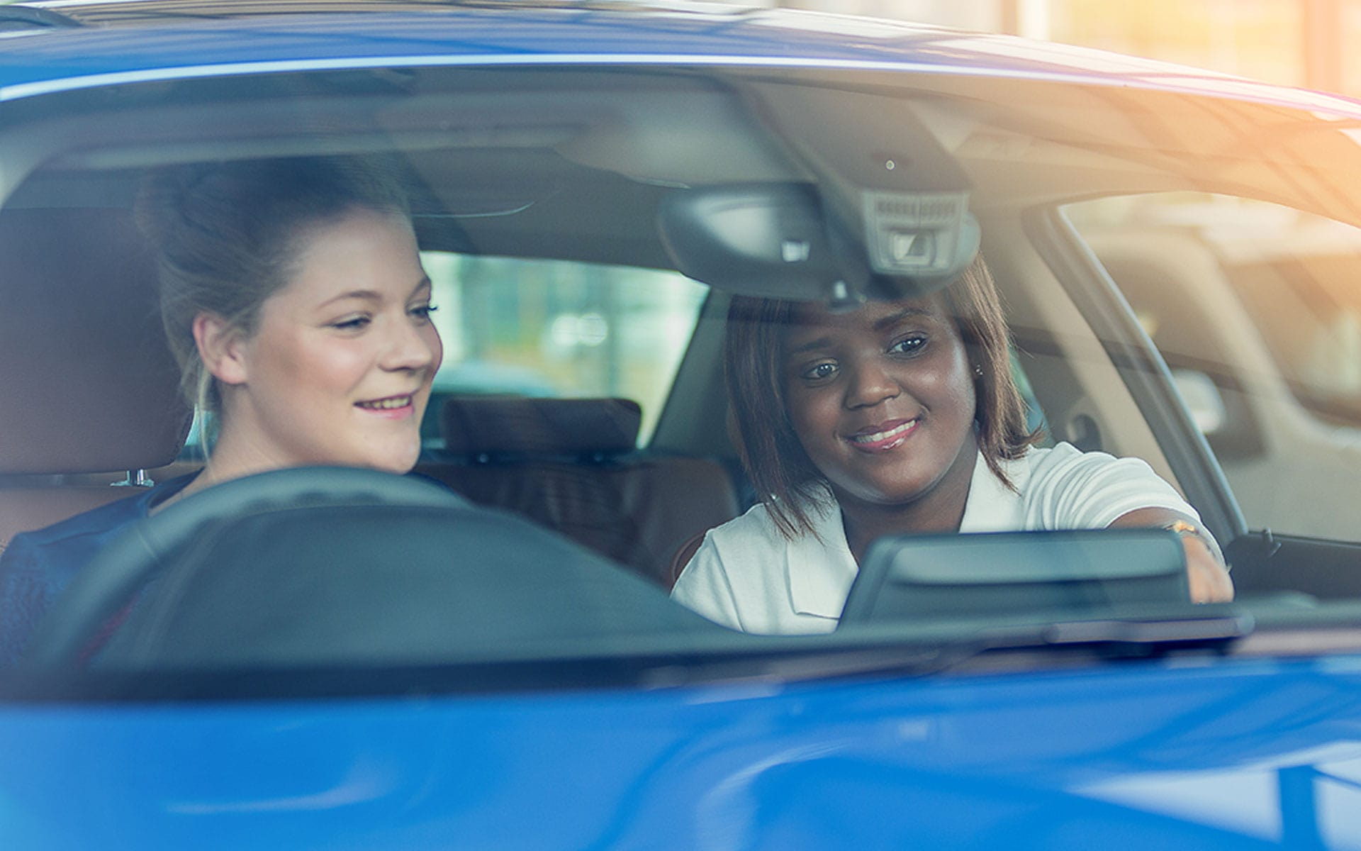 Genius in car with client