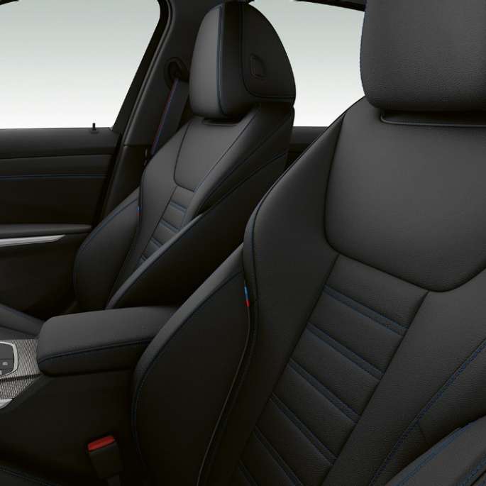 BMW 3 Series Sedan, M340i xDrive front seats. Side close-up of the front seats of the BMW 3 Series M340i xDrive Sedan.