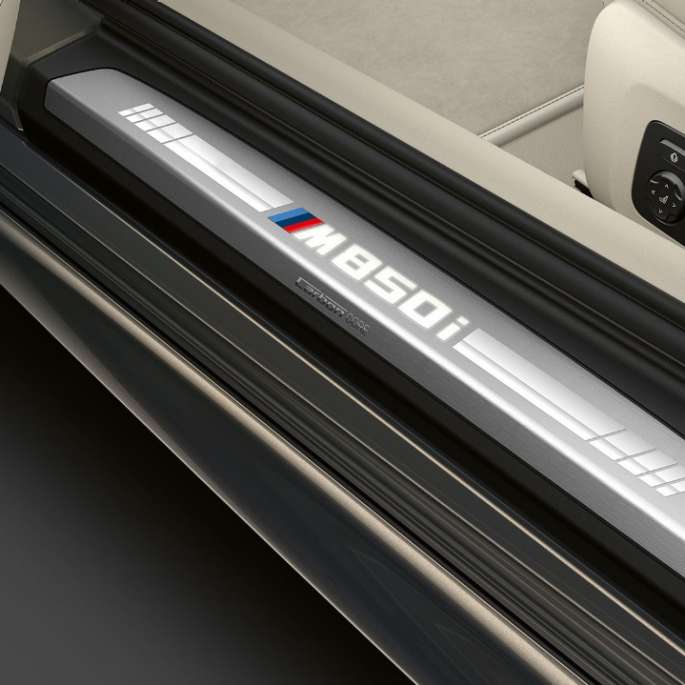 BMW M850i xDrive, Dravit Grey metallic, entry door sill. BMW M850i xDrive, Dravit Grey metallic, entry door sill.